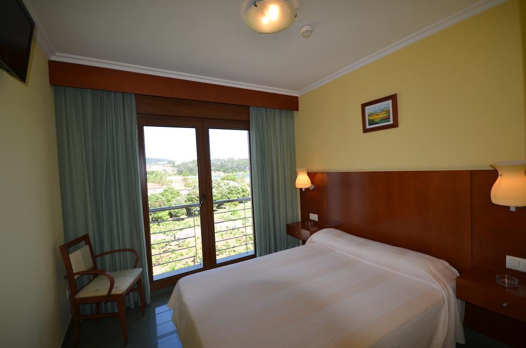 Hotel Maracaibo Portonovo Quarto foto