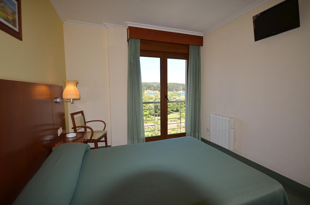 Hotel Maracaibo Portonovo Quarto foto