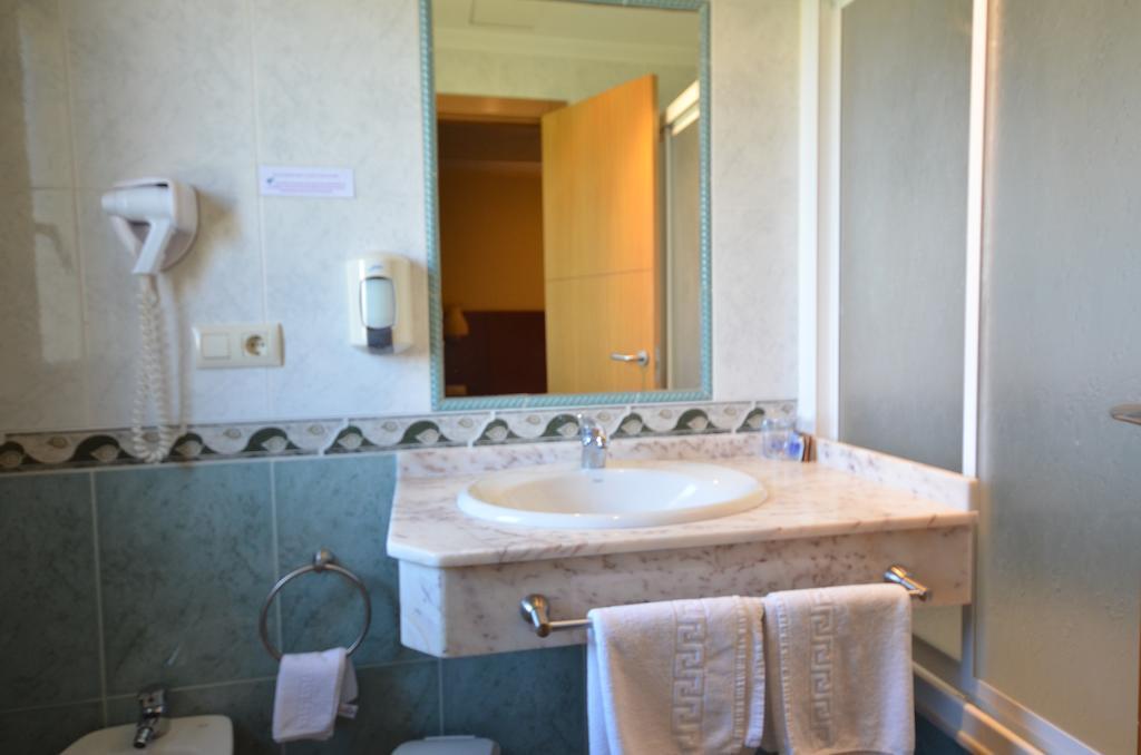 Hotel Maracaibo Portonovo Quarto foto